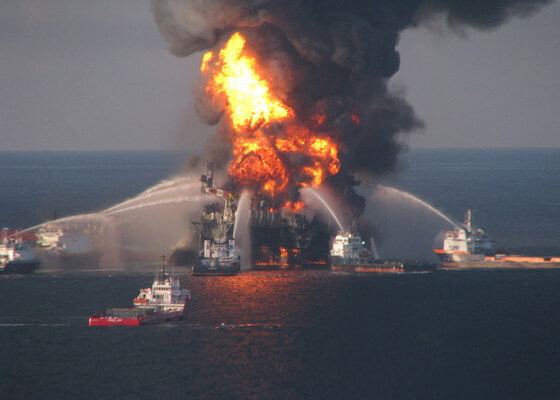 Fire boat response crews battle the blazing remnants of the offshore oil rig Deepwater Horizon image